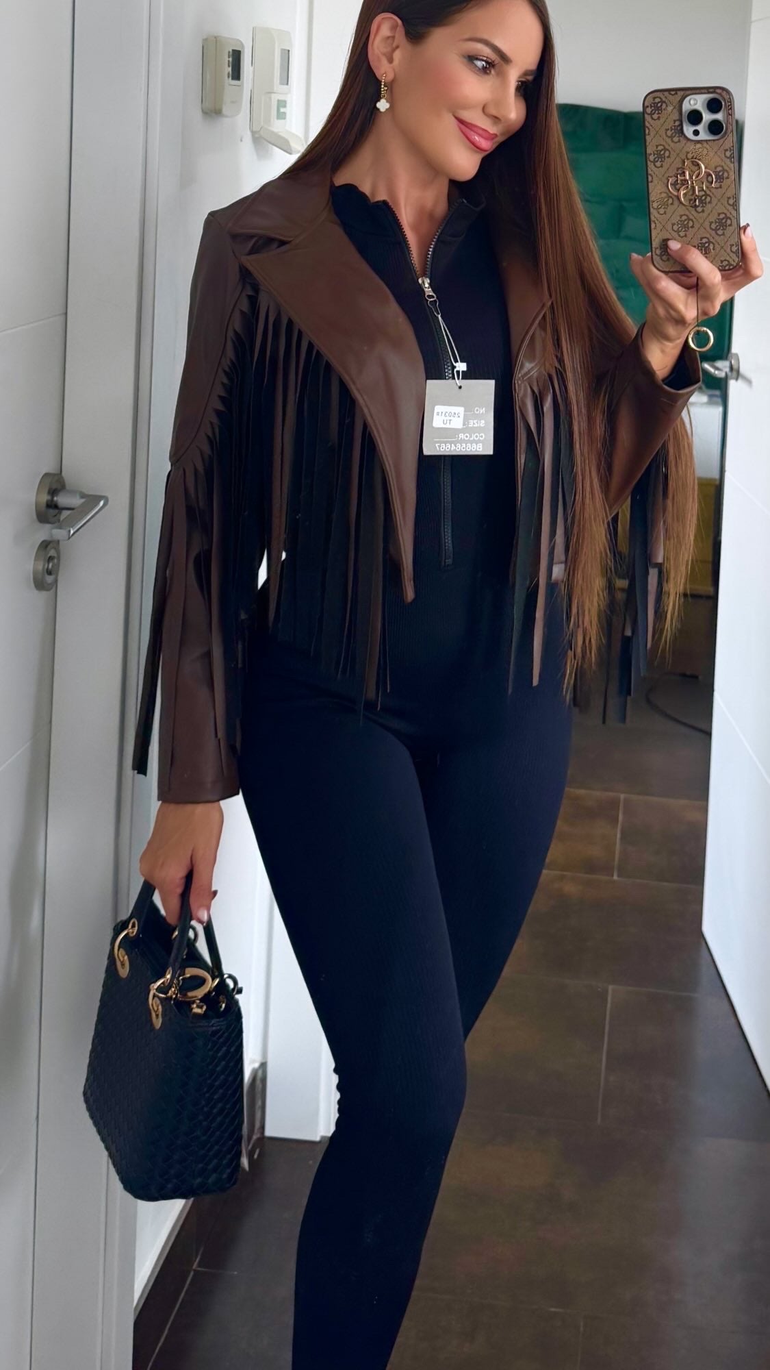 Chaqueta flecos polipiel