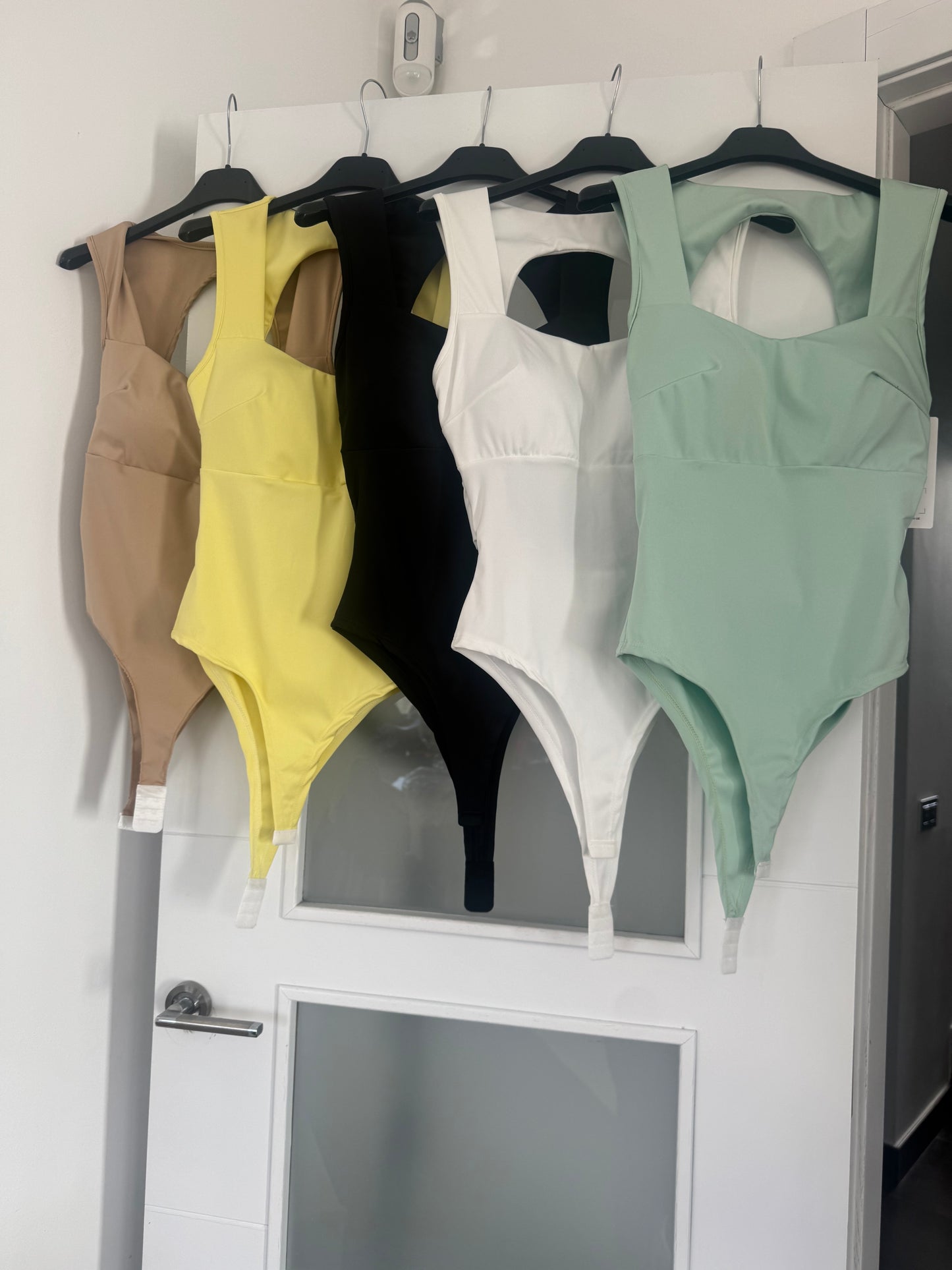 Body relleno escote espalda