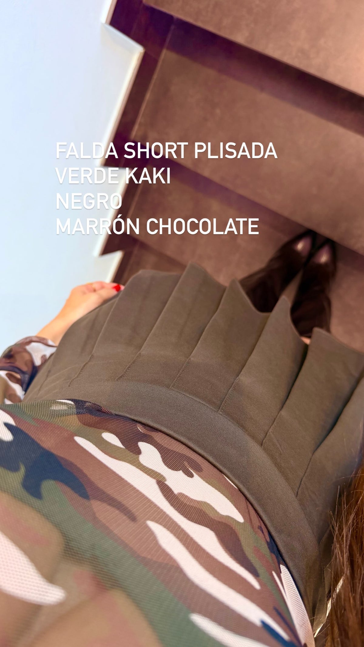 Falda short plisada